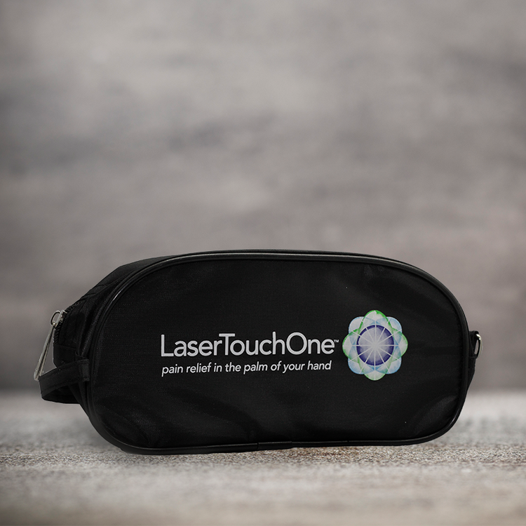 Photo of a Laser Touch One carrying case set on a gray background